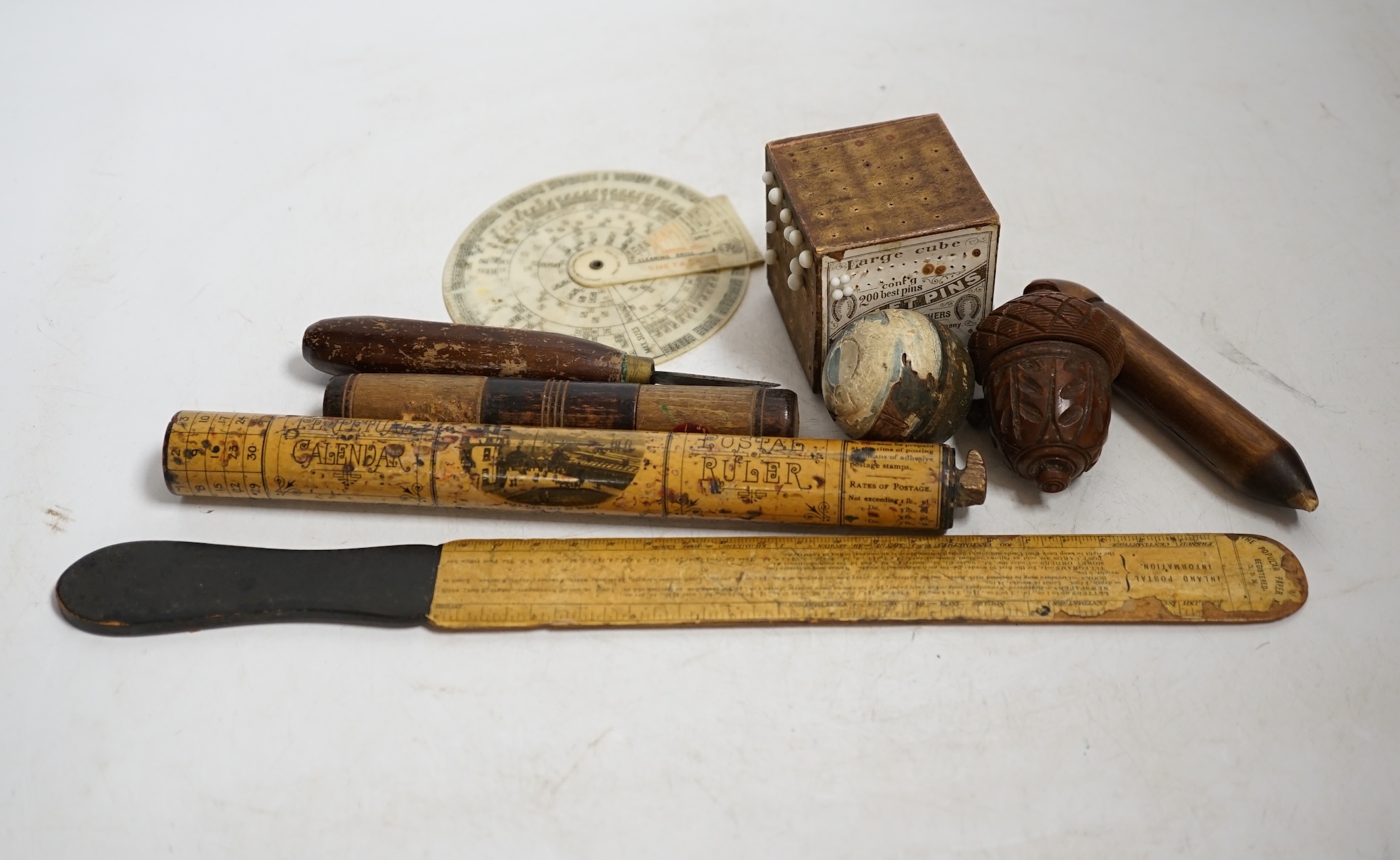 A collection of treen and sundry items to include bone crochet hooks, sewing items, a treen cricket bat shaped letter opener, etc. Condition - varies, poor to fair